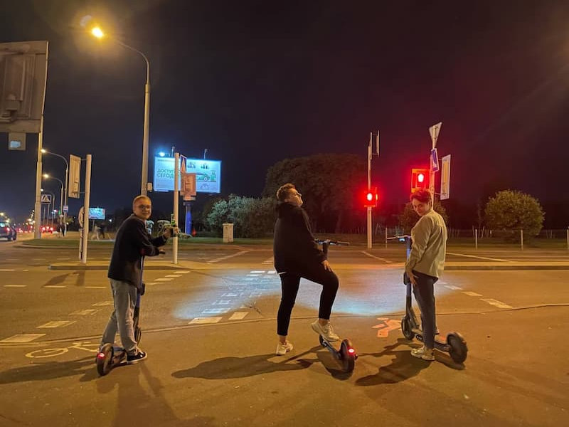 Part of the 69pixels team rides together on electric scooters after a hard day&#x27;s work