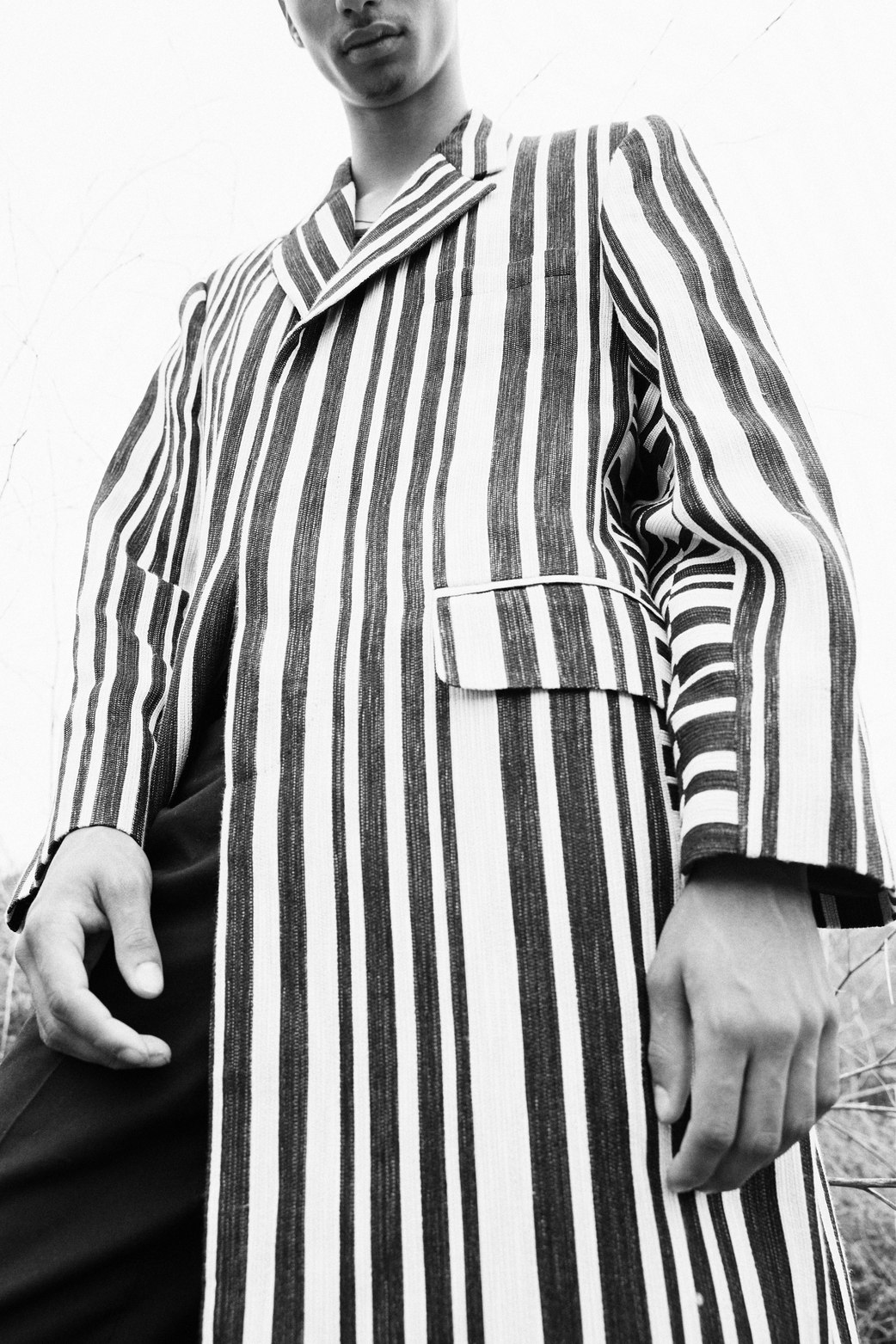 mens fashion model wearing black and white striped blazer shot by chris gonzales a los angeles based photographer