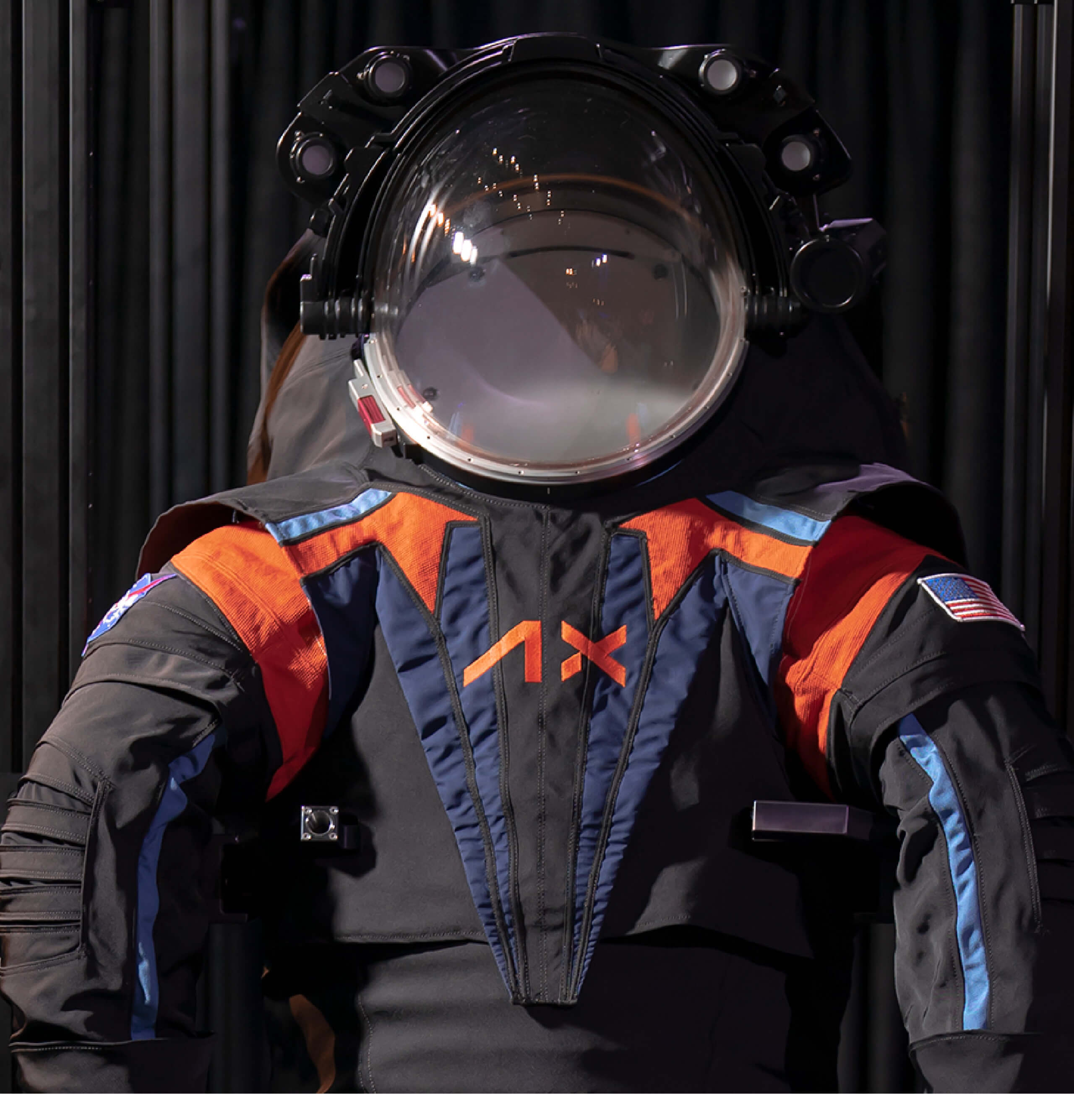 The axiom Space logo prominently featured on the front of the new space suit set for the moon mission.
